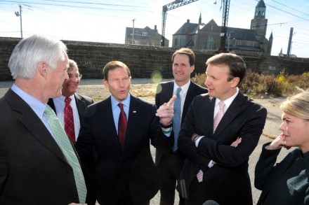 From left, Mayor Bill Finch, Connecticut Department of Transportation Commissioner James Redeker, U.S. Sen. Richard Blumenthal, U.S. Rep. Jim Himes, U.S. Sen. Chris Murphy and Administrator of the Federal Railroad Administration Sarah Feinberg meet near the future site of Barnum Station. CT Post photo Ned Gerard.